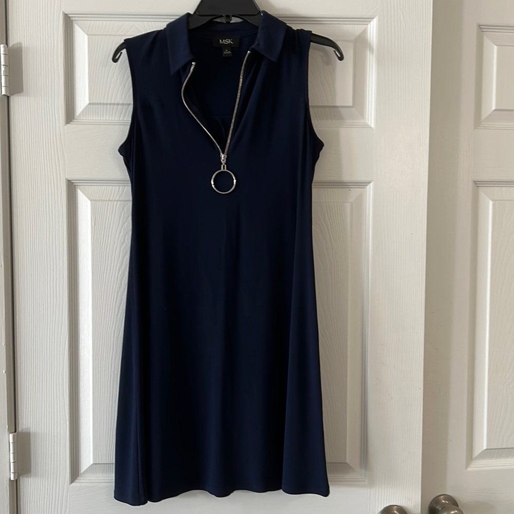 SAlE. Sleeveless zipper front knee length dress
